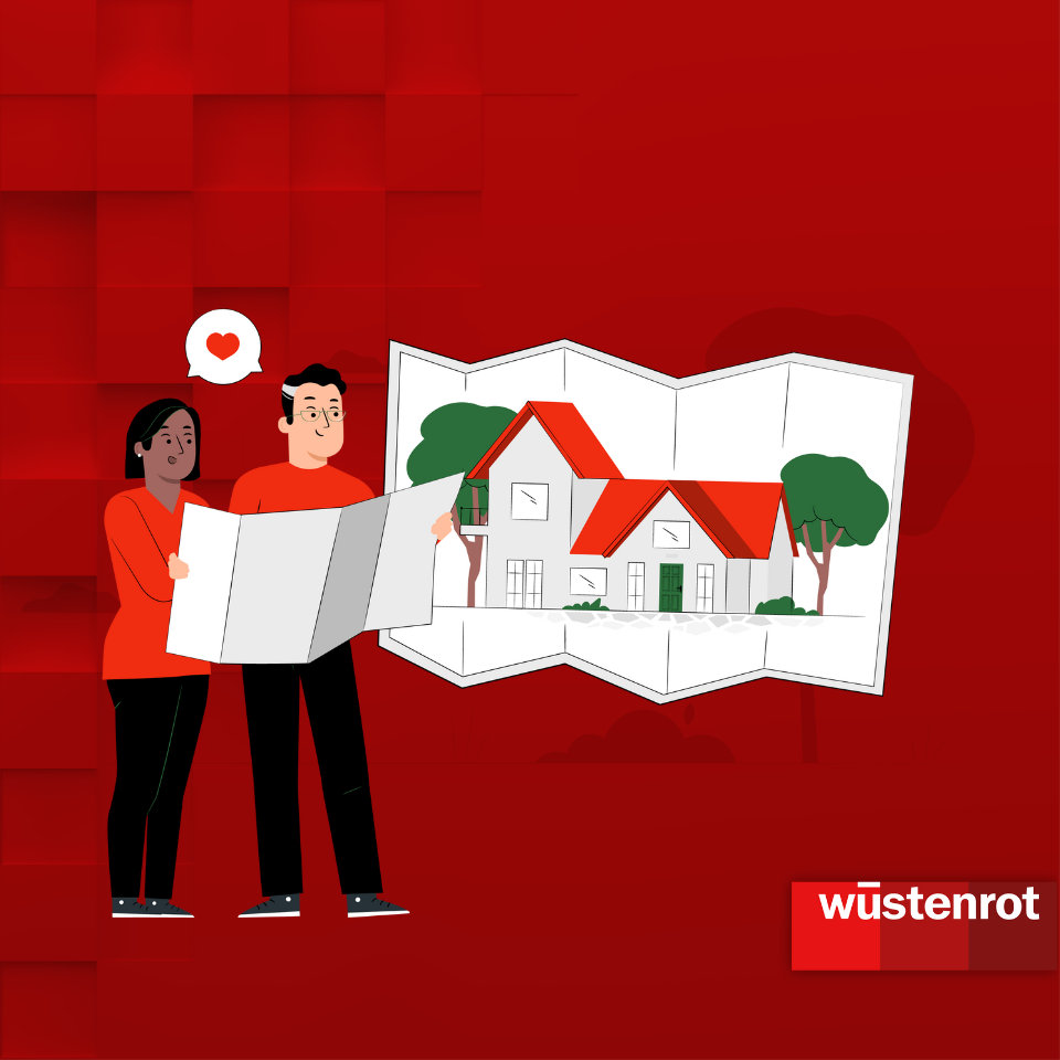 Mann und Frau schauen auf einen Bauplan für ein Haus